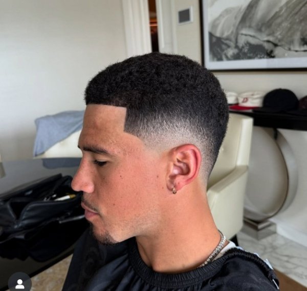 It looks pretty neat! Barber shows Devin Booker s new hairstyle